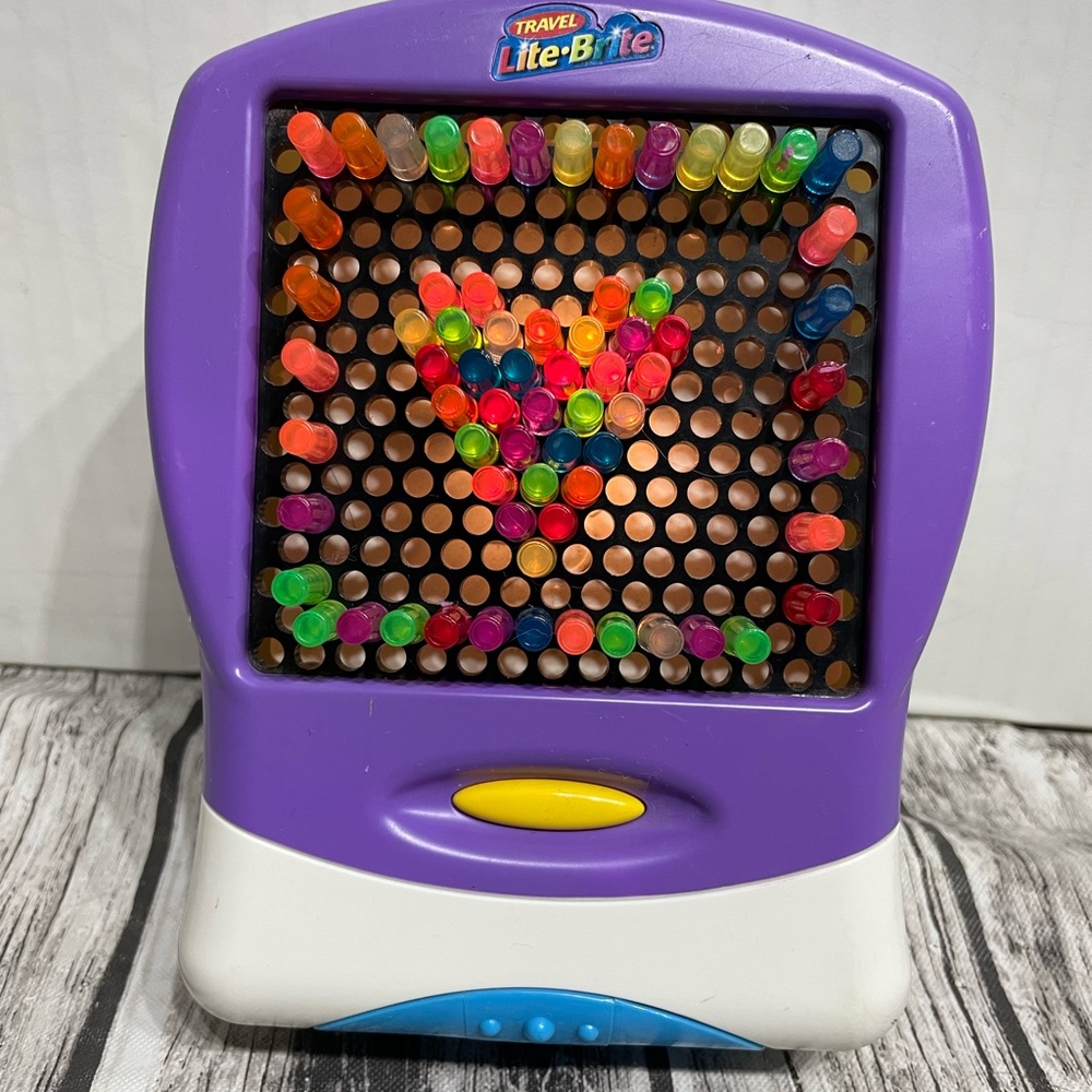 Travel light brite w 72 rainbow colored pegs hours of fun on the road or at home